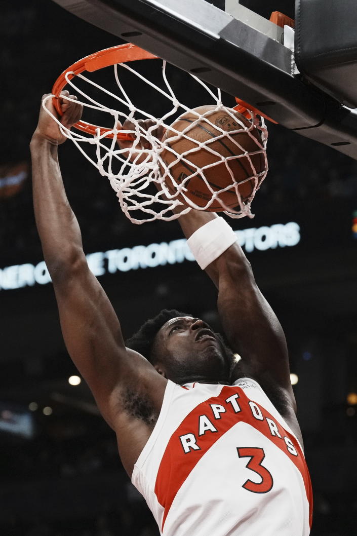 Toronto Raptors' O.G. Anunoby dunks during the first half of an NBA basketball game against the Orlando Magic, Saturday, Dec. 3, 2022 in Toronto. (Chris Young/The Canadian Press via AP)