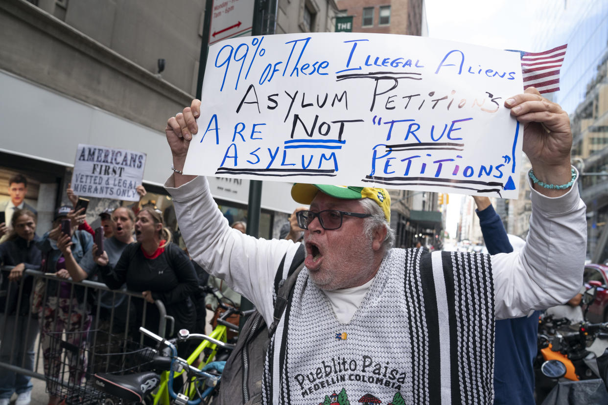 Anti-migrant protestors heckle New York Congressional members, including Reps. Alexandria Ocasio-Cortez, Nydia Velazquez, Jamaal Bowman, Adriano Espaillat and Jerry Nadler on Sept. 15 in Manhattan.