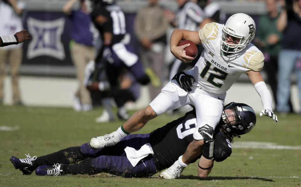 TCU defensive end Mat Boesen (9) leads the Big 12 in sacks. His teammate, Ben Banogu, is second. (AP Photo/Brandon Wade, File)