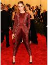 <p>Kristen Stewart wearing a <a href="http://www.elleuk.com/catwalk/designer-a-z/stella-mccartney/autumn-winter-2014" rel="nofollow noopener" target="_blank" data-ylk="slk:Stella McCartney;elm:context_link;itc:0;sec:content-canvas" class="link ">Stella McCartney</a> bordeaux lace jumpsuit, studded pumps and gold square box clutch to the Costume Institute Gala for the PUNK - Chaos to Couture exhibition.</p>