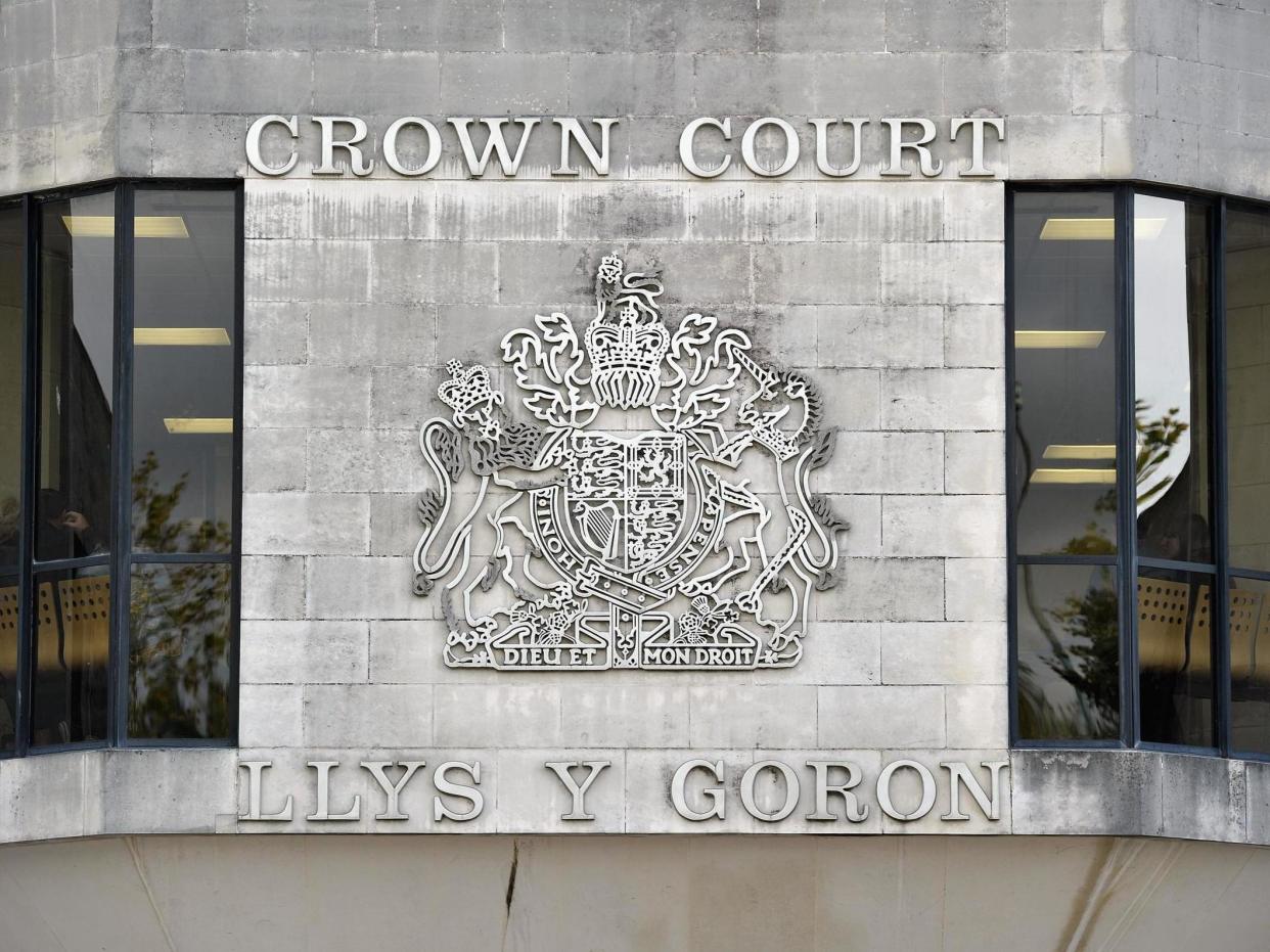 The trial continues at Swansea Crown Court: PA