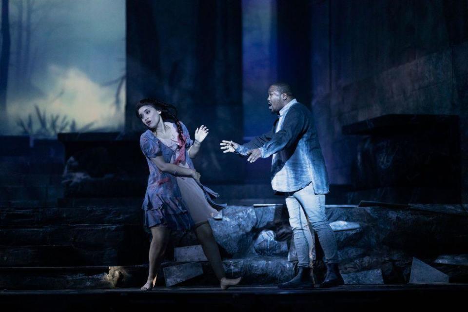 South African opera singers Brittany Smith (L) and Lukhanyo Moya (R) gesture on stage in Johannesburg, South Africa - Tuesday, July 23, 2024