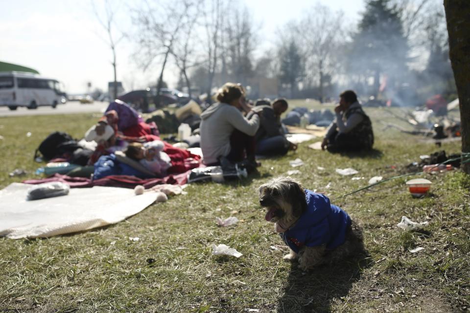 Migrants gather in Edirne, near the Turkish-Greek border on Friday, March 6, 2020. Clashes erupted anew on the Greek-Turkish border Friday as migrants attempted to push through into Greece, while the European Union's foreign ministers held an emergency meeting to discuss the situation on the border and in Syria, where Turkish troops are fighting. (AP Photo/Emrah Gurel)