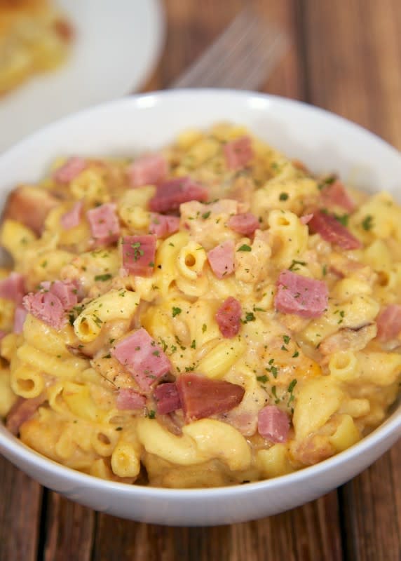 <p>Plain Chicken</p><p>No need to boil the noodles! They cook right in the slow cooker.</p><p><strong>Get the recipe: <a href="https://www.plainchicken.com/slow-cooker-macaroni-cheese-with-ham/" rel="nofollow noopener" target="_blank" data-ylk="slk:Slow Cooker Macaroni and Cheese with Ham;elm:context_link;itc:0;sec:content-canvas" class="link ">Slow Cooker Macaroni and Cheese with Ham</a></strong></p>