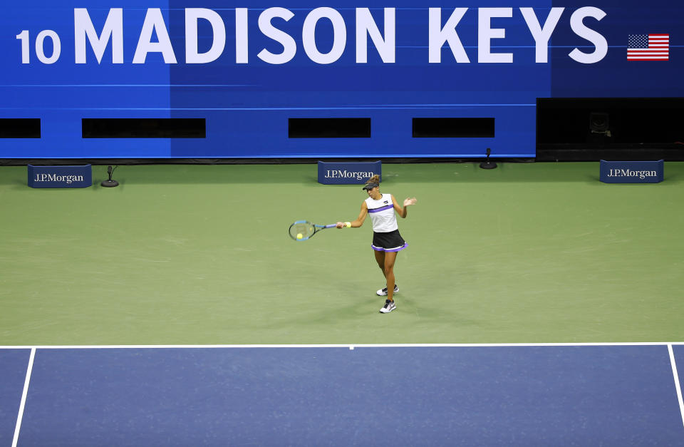 Madison Keys, of the United States, warms up before her match against Elina Svitolina, of Ukraine, during the fourth round of the U.S. Open tennis tournament, Sunday, Sept. 1, 2019, in New York. (AP Photo/Jason DeCrow)