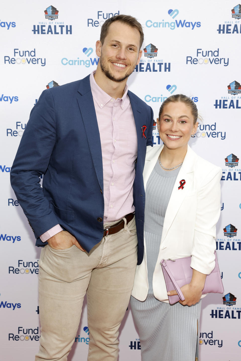 NASHVILLE, TENNESSEE - APRIL 04: (L-R) Andrew East and Shawn Johnson East, wearing The Covenant School ribbon, attend the Pro Football Hall Of Fame's Family Recovery Fund charity concert and dinner with proceeds benefiting the Covenant School held at The Twelve Thirty Club on April 04, 2023 in Nashville, Tennessee. (Photo by Jason Kempin/Getty Images)