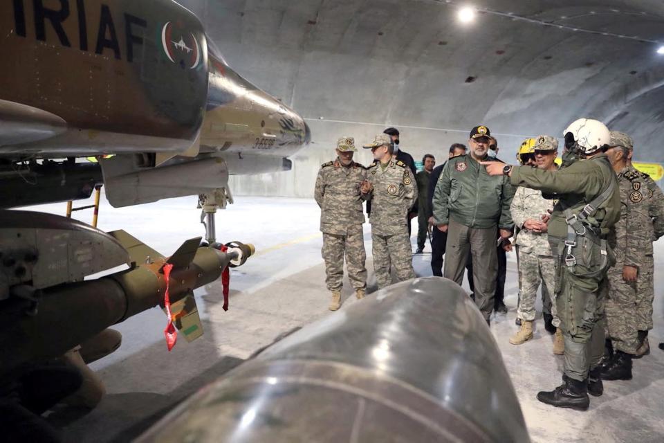 Iran's Army chief and the Iranian Armed Forces Chief of Staff visit the first underground air force base, called "Eagle 44" at an undisclosed location in Iran, in this handout image obtained on February 7, 2023.