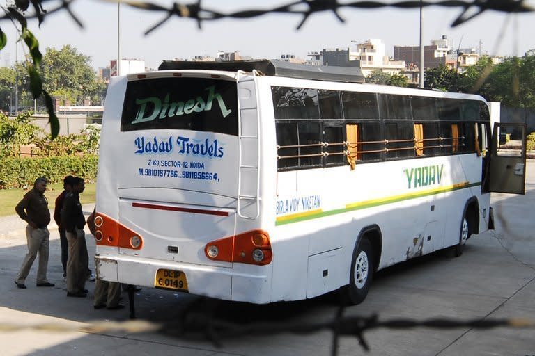 Indian police on December 18, 2012 inspect the bus on which a student was gang-raped in New Delhi. The woman was savagely assaulted and later died of her wounds. Six men were initially arrested over the crime