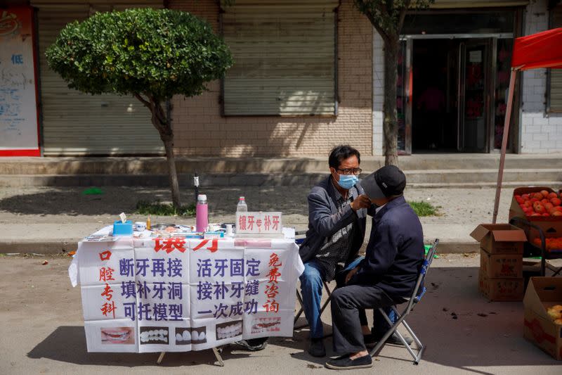 The Wider Image: Energy security and economic fears drive China's return to coal