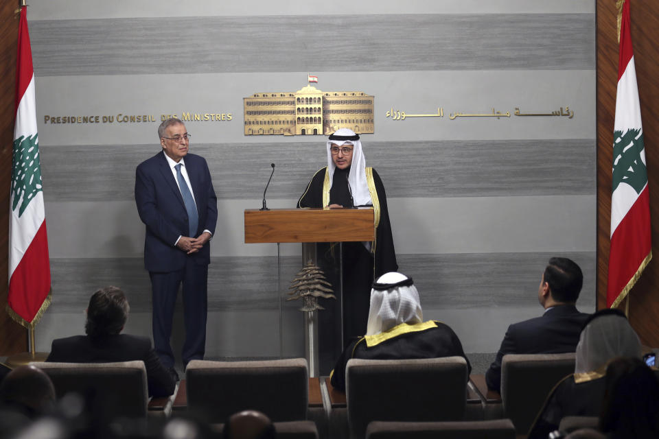 Kuwaiti Foreign Minister Sheikh Ahmad Nasser al-Mohammad al-Sabah, right, speaks during a joint press conference with his Lebanese counterpart Abdallah Bouhabib, in Beirut, Lebanon, Saturday, Jan. 22, 2022. (AP Photo/Bilal Hussein)