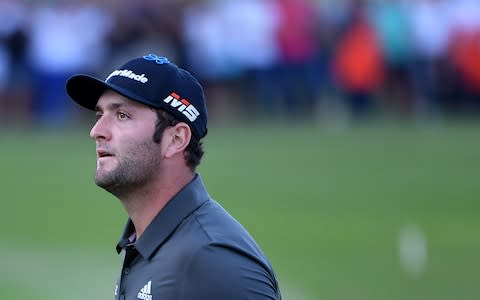 Jon Rahm reacts after the final putt  - Credit: AFP