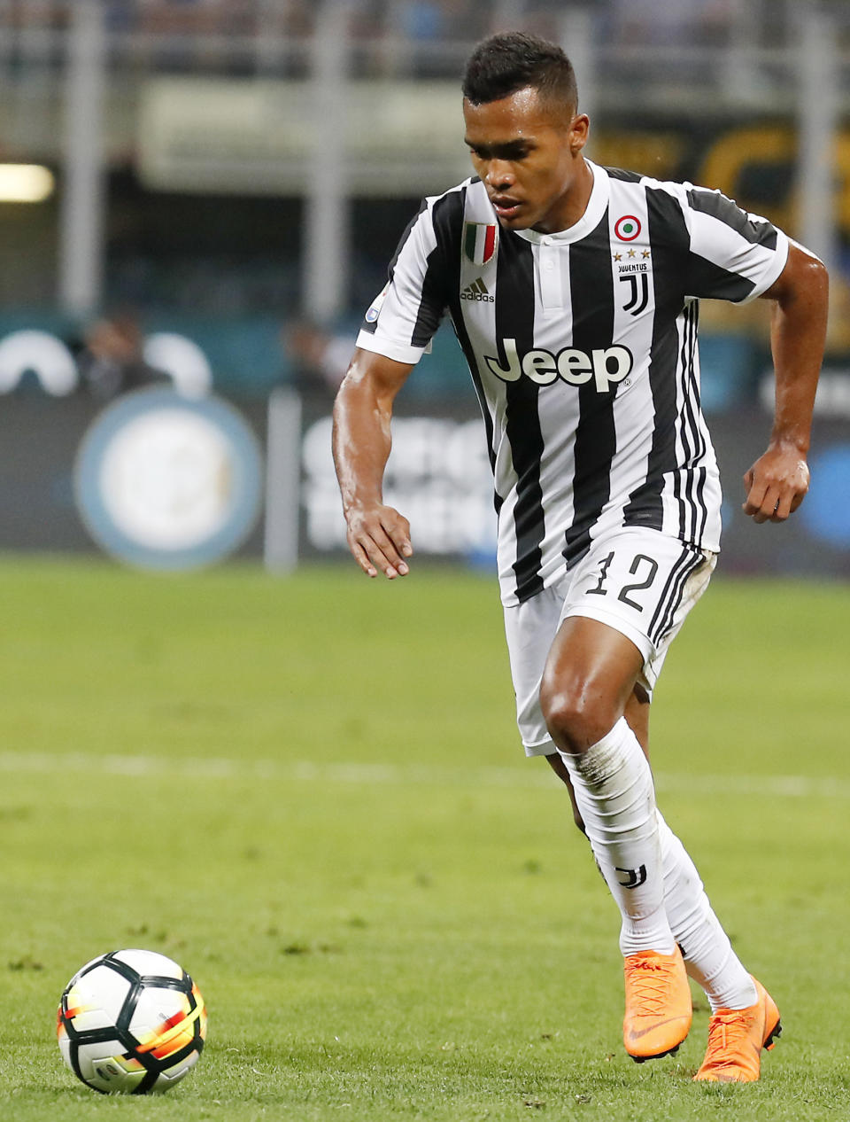 FILE -- In this April 29, 2018 file photo, Juventus' Lobo Alex Sandro controls the ball during the Serie A soccer match between Inter Milan and Juventus at the San Siro stadium in Milan, Italy. Alex Sandro has renewed his contract with Juventus until 2023, Juventus announced with a statement on its website Thursday, Dec. 20, 2018. (AP Photo/Antonio Calanni)