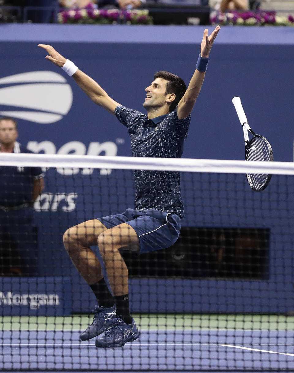 Novak Djokovic, of Serbia, celebrates after defeating Juan Martin del Potro, of Argentina, during the men's final of the U.S. Open tennis tournament, Sunday, Sept. 9, 2018, in New York. (AP Photo/Julie Jacobson)