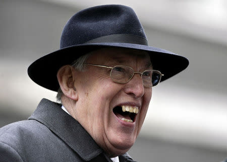 Democratic Unionist Party leader Ian Paisley smiles as he talks to media in Downing Street in this March 22, 2007 file photograph. REUTERS/Kieran Doherty/Files