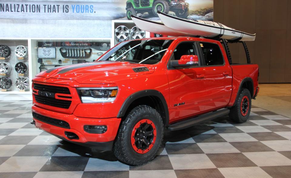 <a href="https://www.caranddriver.com/ram/1500" rel="nofollow noopener" target="_blank" data-ylk="slk:The 2019 Ram 1500;elm:context_link;itc:0;sec:content-canvas" class="link ">The 2019 Ram 1500</a> has yet to go on sale, but Ram is already eager to show off the many Mopar parts and accessories it plans to offer on its new half-ton pickup. This kayak-carrying, off-road-ready 2019 Ram 1500 4×4 crew cab is just one way Ram envisions consumers customizing their personal trucks. Starting life as a lower-level Big Horn model with the optional Sport package, this Ram has been decked out in accessories such as a 2.0-inch lift kit, a set of 18-inch wheels with red trim rings, chunky 35-inch tires, wheel-well flares, a pair of cast-aluminum running boards, front tow hooks, black hood stripes and emblems, and Mopar’s nifty new Ram Rack. <a href="https://blog.caranddriver.com/mo-ram-ram-shows-off-mopar-ized-1500-pickup/" rel="nofollow noopener" target="_blank" data-ylk="slk:READ MORE ››;elm:context_link;itc:0;sec:content-canvas" class="link ">READ MORE ››</a>