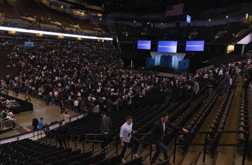 Shareholders file into the CHI Health Center arena for the Berkshire Hathaway annual meeting on Saturday, May 6, 2023, in Omaha, Neb. (AP Photo/Rebecca S. Gratz)