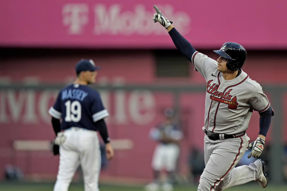 Atlanta Braves' Austin Riley runs the bases after hitting a solo home run during the first inning of a baseball game against the Kansas City Royals Friday, April 14, 2023, in Kansas City, Mo. (AP Photo/Charlie Riedel)