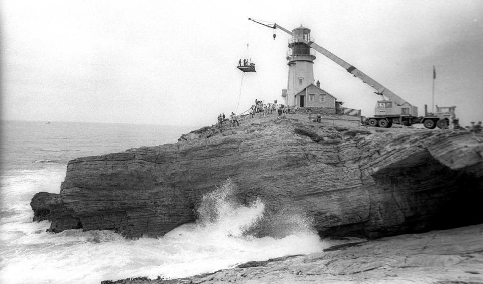 A crane lifts a camera platform during filming of Pete’s Dragon at Point Buchon featuring Mickey Rooney as Lample and Helen Reddy and daughter Nora and introducing child actor Sean Marshall (pictured with his mother Sharon). The Walt Disney film was made to simulate Passamaquoddy, Maine and a movie set 52 foot lighthouse was built south of Montaña de Oro State Park. With a budget of $8 million it was the most expensive Disney production at the time, July 30, 1976.