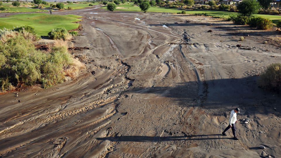 Tropical storm Hilary caused a section of the normally-dry Whitewater River to flood parts of a golf course in Cathedral City, California. (Photo by Mario Tama/Getty Images) - Mario Tama/Getty Images