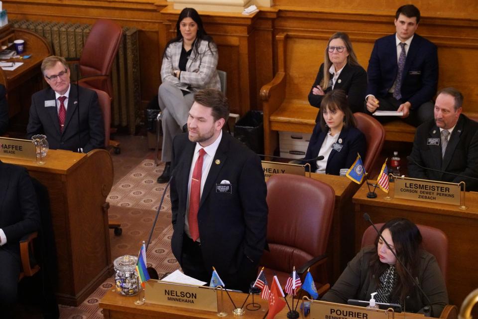 Rep. Kameron Nelson, D-Sioux Falls, speaks on HB 1080 that would limit gender affirming care for transgender children in Pierre on Thursday, Feb. 2.