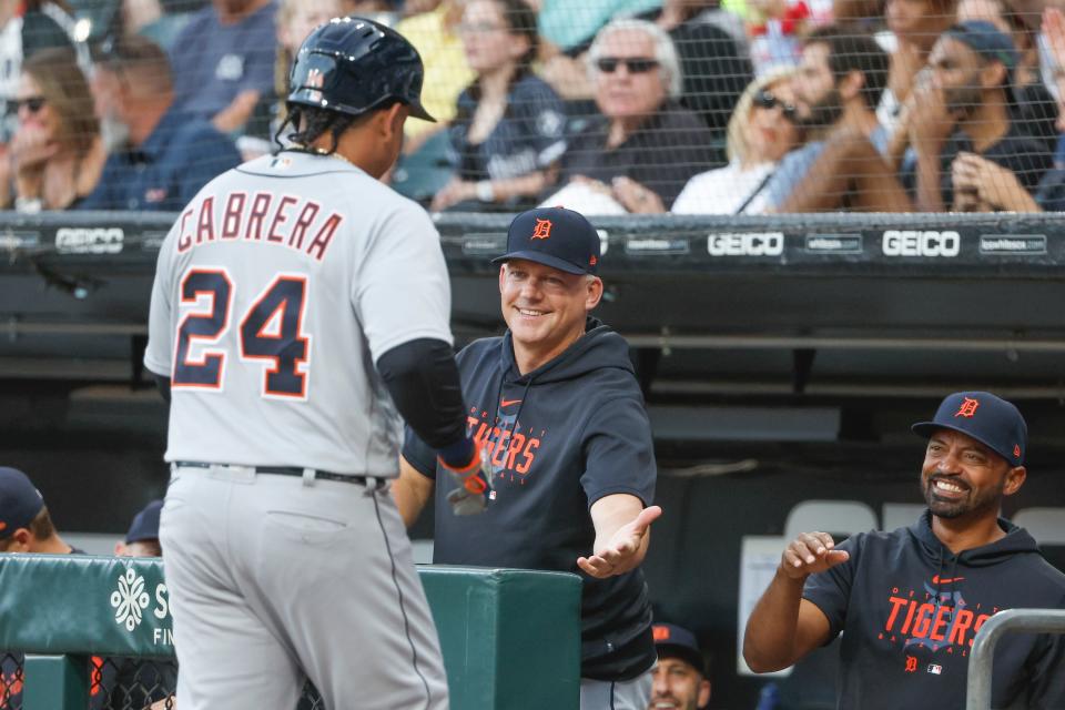 Detroit Tigers designated hitter Miguel Cabrera (24) is congratulated by manager A.J. Hinch (14) after scoring against the Chicago White Sox during the first inning at Guaranteed Rate Field in Chicago on Saturday, Sept. 2, 2023.