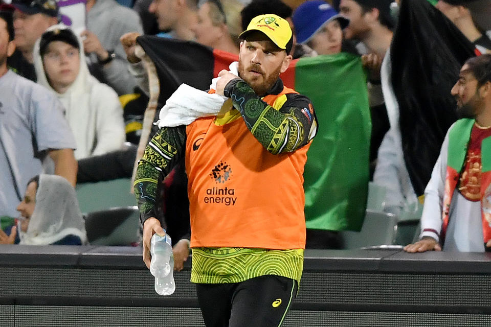 Aaron Finch (pictured) carries the water.