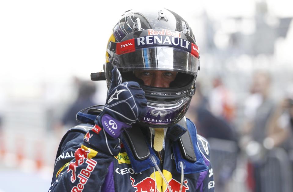 Red Bull Formula One driver Sebastian Vettel of Germany reacts after the qualifying session of the Indian F1 Grand Prix at the Buddh International Circuit in Greater Noida, on the outskirts of New Delhi, October 26, 2013. REUTERS/Adnan Abidi (INDIA - Tags: SPORT MOTORSPORT F1)