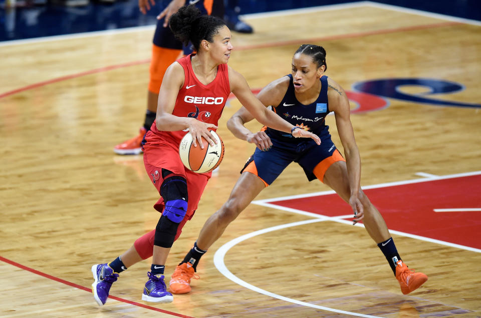 WASHINGTON, DC - OCTOBER 10:  Kristi Toliver #20 of the Washington Mystics handles the ball against the Connecticut Sun in Game 5 of the 2019 WNBA Finals at St Elizabeths East Entertainment & Sports Arena on October 10, 2019 in Washington, DC.  (Photo by G Fiume/Getty Images)