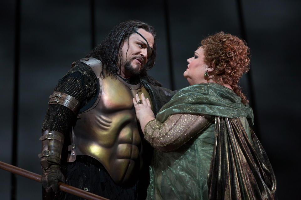 In this April 3, 2013 photo provided by the Metropolitan Opera, Mark Delavan performs in the role of Wotan with Stephanie Blythe as Fricka in Wagner's "Das Rheingold," during the final dress rehearsal at the Metropolitan Opera in New York. (AP Photo/Metropolitan Opera, Marty Sohl)