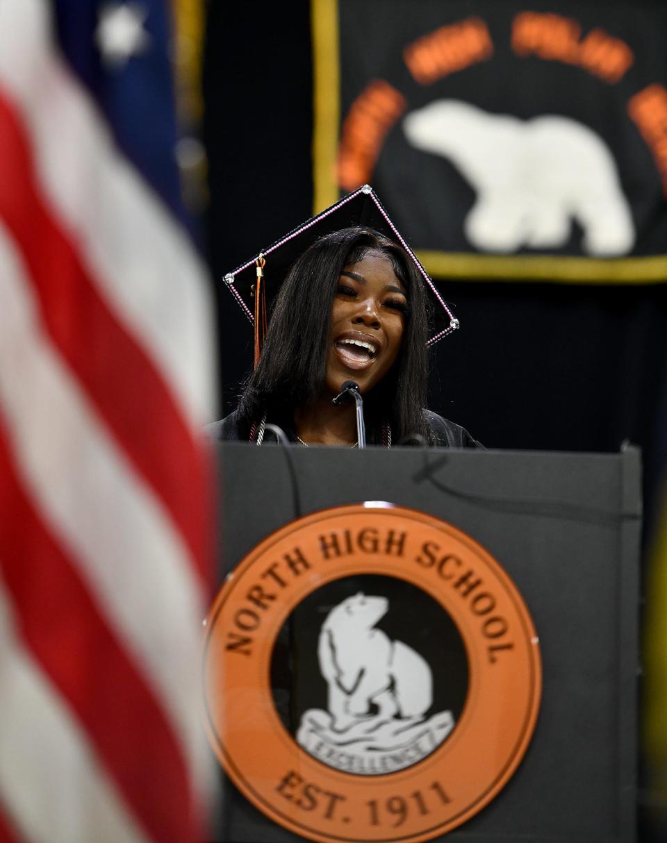 Daniella Desinor sings the national anthem during North High's commencement at the DCU Center Wednesday evening.