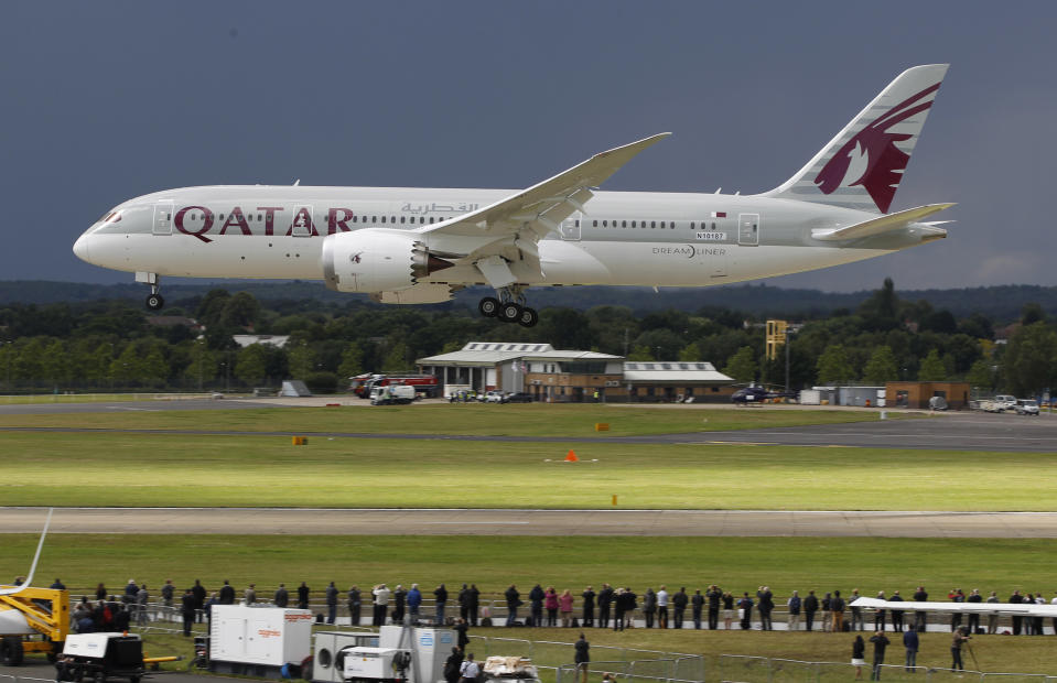 A Qatar Airways Boeing 787 Dreamliner lands during an aerial display on the third day of the Farnborough International Airshow, in Farnborough, England, Wednesday, July 11, 2012. (AP Photo/Lefteris Pitarakis)