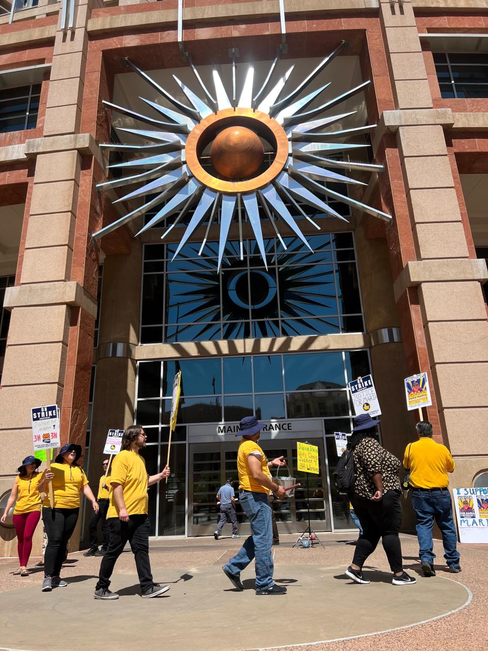 United Food and Commercial Workers Local 99 members protest the termination of custodial worker Maria Sanchez, outside Phoenix City Hall April 10, 2024. Sanchez was fired by 3H & 3H over uniform violations, but she believes it was retaliation for trying to unionize.