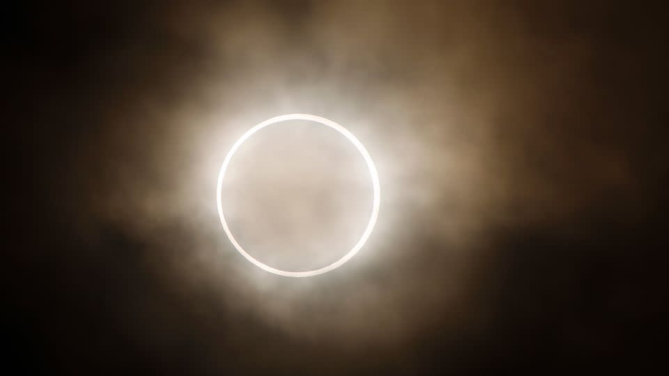 When the moon crosses between Earth and the sun during an annular solar eclipse, a signature "ring of fire" of sunlight is still visible. - Shuji Kajiyama/AP