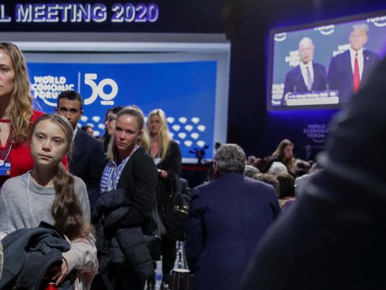 Thunberg leaves after Trump finishes his speech in Davos (Reuters)