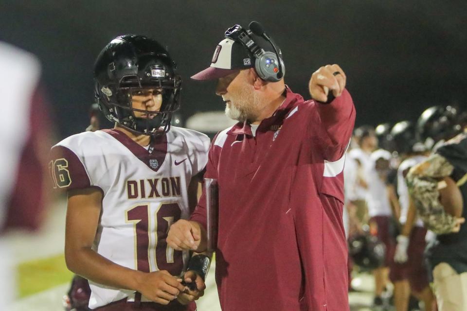 Dixon at White Oak in area high school football Week 9 action Friday night. [Tina Brooks / The Daily News]