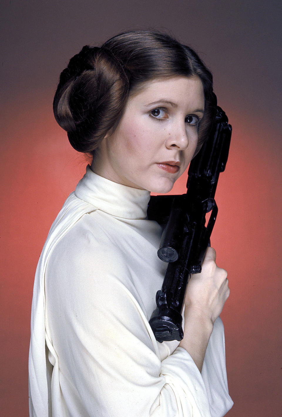 Billie Lourd’s Tom Ford dress was inspired by Carrie Fisher’s Princess Leia look. (Photo: Everett Collection)