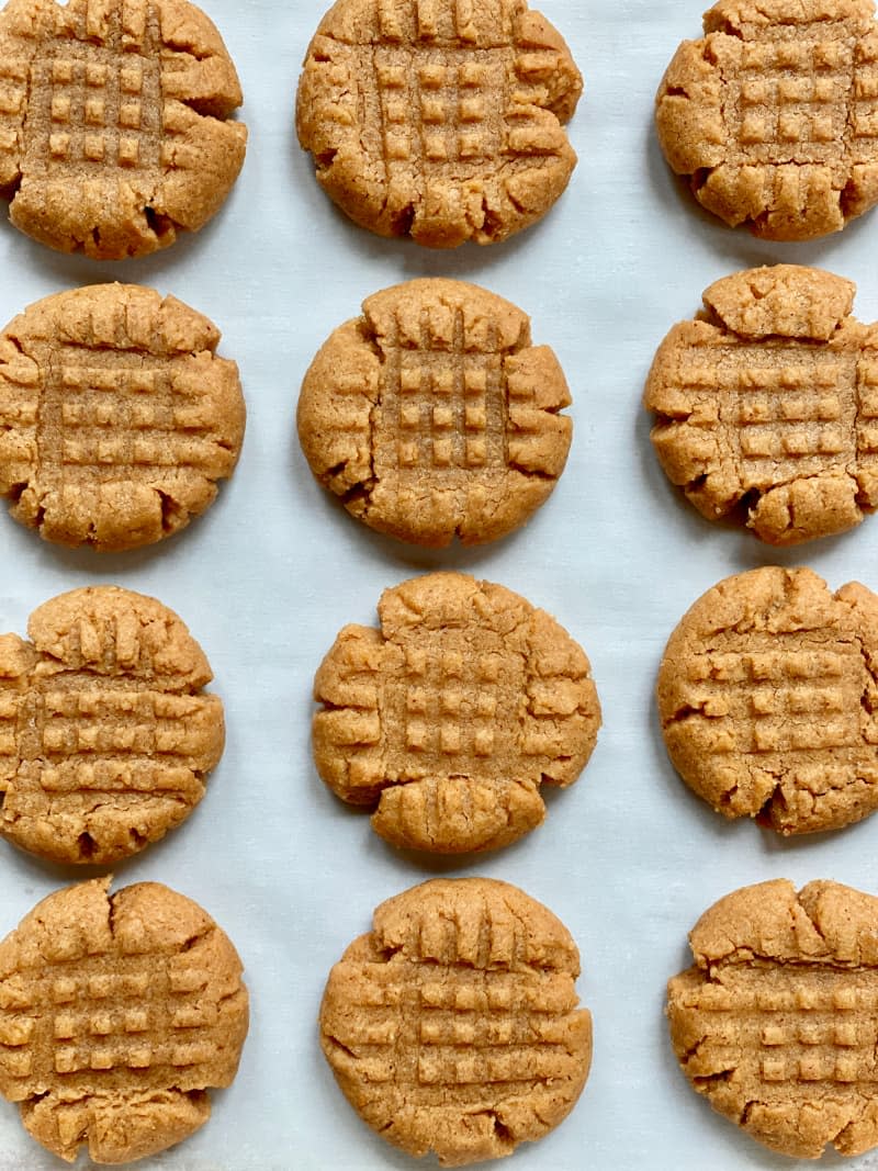Peanut butter cookies on baking sheet.