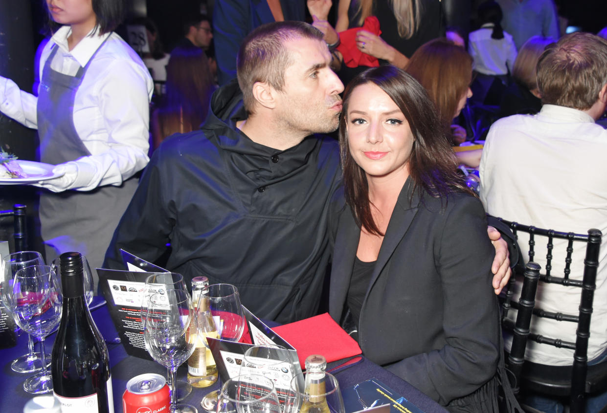 Liam Gallagher (L) and Debbie Gwyther girlfriend at The Q Awards 2017