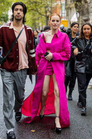 <p>Christian Vierig/Getty</p> Madelaine Petsch and Anthony Li outside Valentino Paris Fashion Week - Womenswear Spring/Summer 2023 on October 2, 2022.