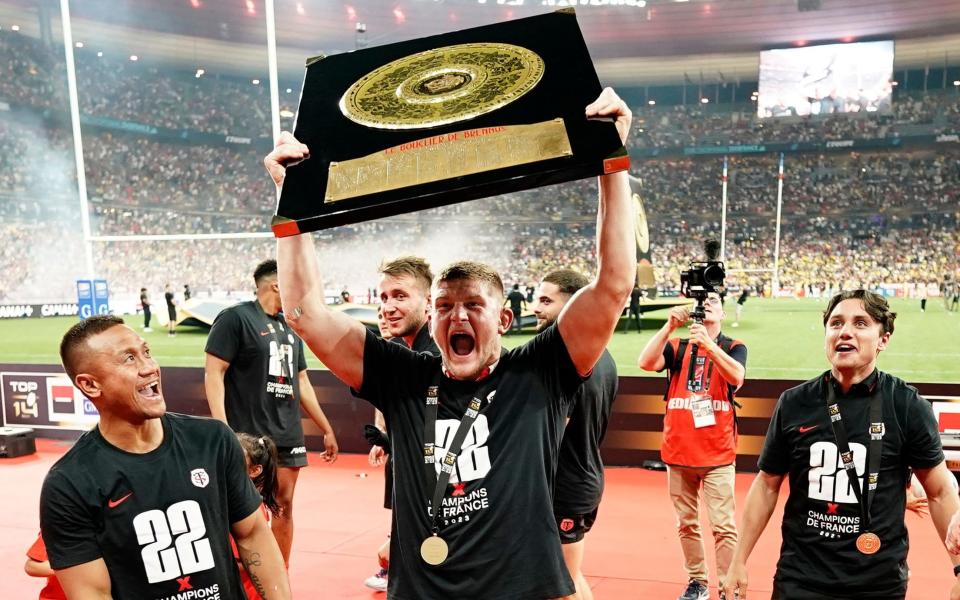 Jack Willis of Toulouse lifts the Bouclier de Brennus trophy after his side wins the final in dramatic style Toulouse v La Rochelle