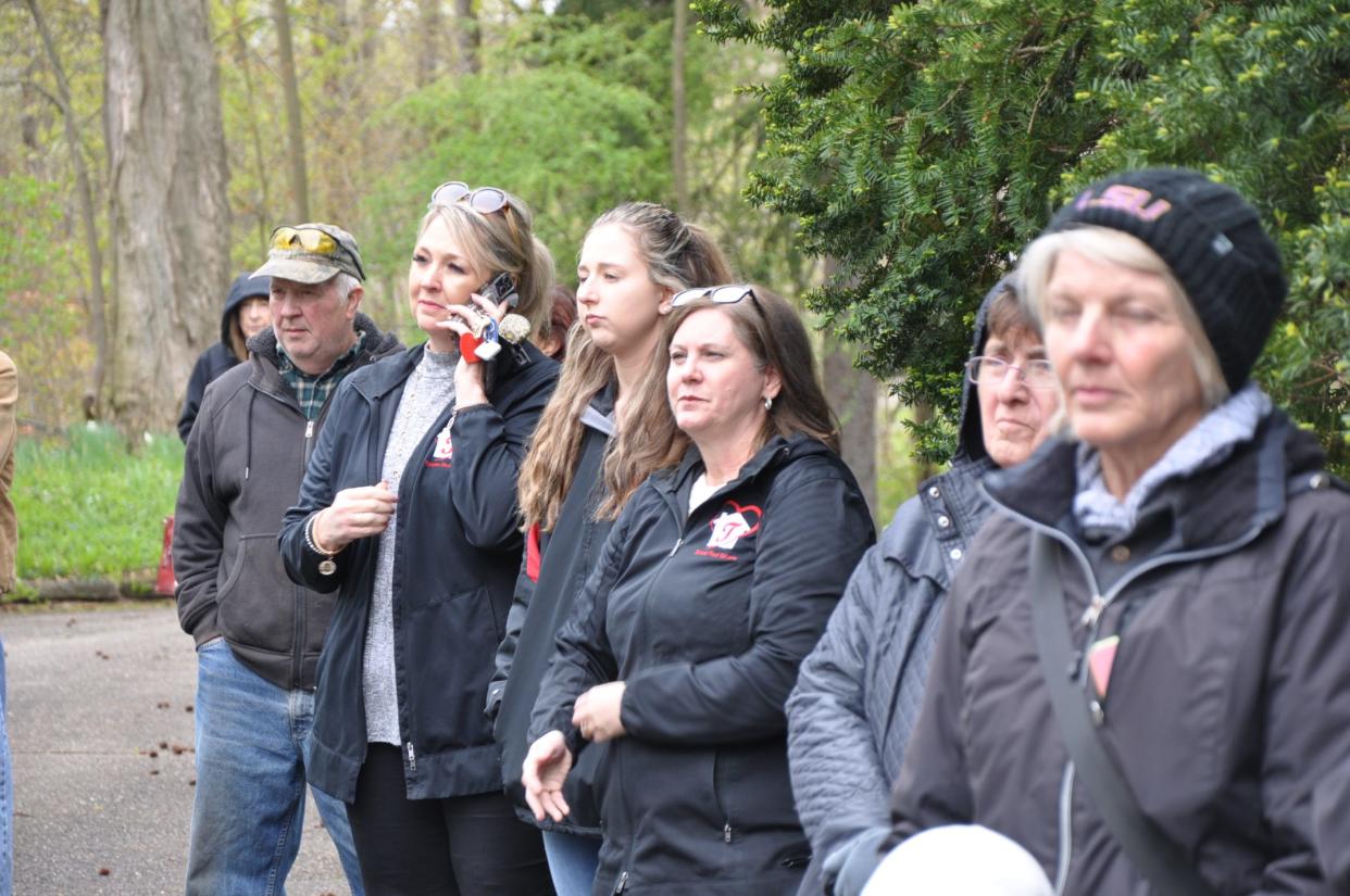 Several dozen people attended the sale of a five-bedroom mansion in Alliance on Wednesday. The mansion was built by the late William H. Morgan Jr.