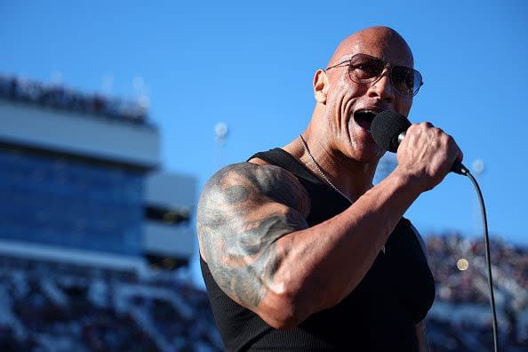 DAYTONA BEACH, FLORIDA - FEBRUARY 19: Grand Marshal Dwayne “The Rock” Johnson gives the command to start engine prior to the NASCAR Cup Series Daytona 500 at Daytona International Speedway on February 19, 2024 in Daytona Beach, Florida. (Photo by Jared C. Tilton/Getty Images)