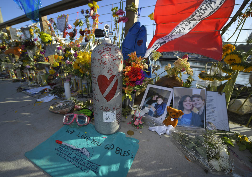 A growing memorial to those who died aboard the dive boat Conception is seen Friday, Sept. 6, 2019, in Santa Barbara, Calif., for the victims who died aboard the dive boat Conception. The Sept. 2 fire took the lives of multiple people on the ship off Santa Cruz Island off the Southern California coast near Santa Barbara. (AP Photo/Mark J. Terrill)