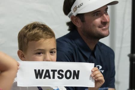 Jun 24, 2018; Cromwell, CT, USA; Bubba Watson son Caleb holds a name banner during a press conference after winning the Travelers Championship at TPC River Highlands. Mandatory Credit: Bill Streicher-USA TODAY Sports