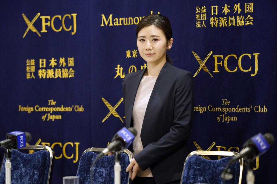 Former Japanese table tennis player and Olympic medallist Ai Fukuhara prepares to make a brief statement during a news conference about a child-custody agreement she forged with ex-husband Chiang Hung-chieh of Taiwan at the Foreign Correspondents' Club of Japan (FCCJ) Friday, March 15, 2024, in Tokyo. (AP Photo/Eugene Hoshiko)