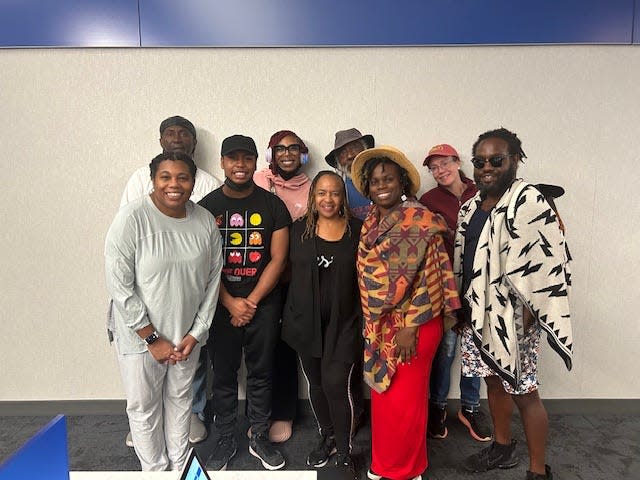 Sierra Leone travelers, Front row, from left: Joyce White, De'andre Brown, Maxine Bryant, Katina Wheeler, Edward Grisham. Back row, from left: Gilbert Walker, Destiny Craig, Hanif Haynes and Kara Sweeney.