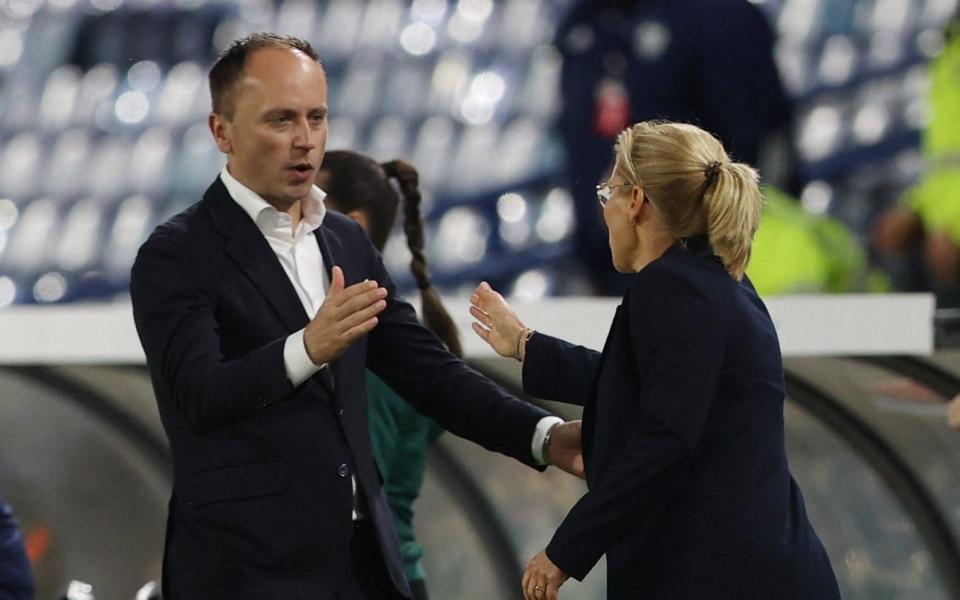 England manager Sarina Wiegman shakes hands with Holland coach Mark Parsons - Action Images via Reuters