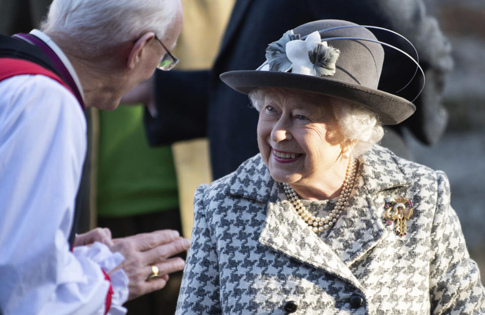 Britain's Queen Elizabeth II leaves after attending a church service at St Mary the Virgin, in Hillington, England, Sunday, Jan. 19, 2020. Buckingham Palace says Prince Harry and his wife, Meghan, will no longer use the titles "royal highness" or receive public funds for their work under a deal that allows them to step aside as senior royals. (Joe Giddens/PA via AP)