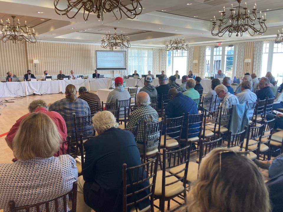 Stakeholders watch on as the New England Fishery Management Council discusses scallop allocation leasing at the Beauport Hotel in Gloucester on Tuesday, Sept. 27.