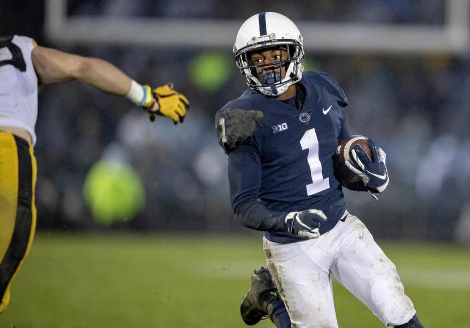 Penn State wide receiver KJ Hamler avoids Iowa defenders during the game on Saturday, Oct. 27, 2018.